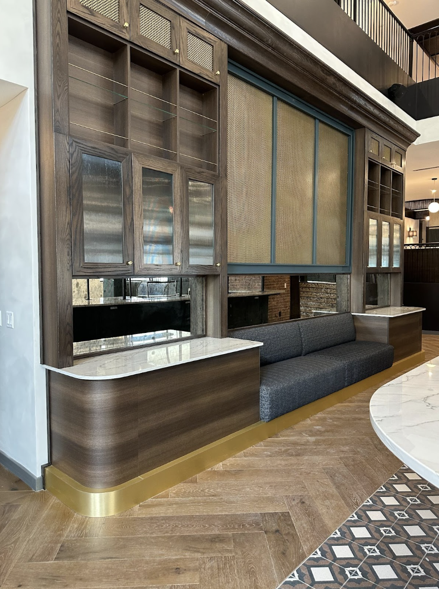 Cabinetry and booths installed inside lobby at Rambler Columbus. 